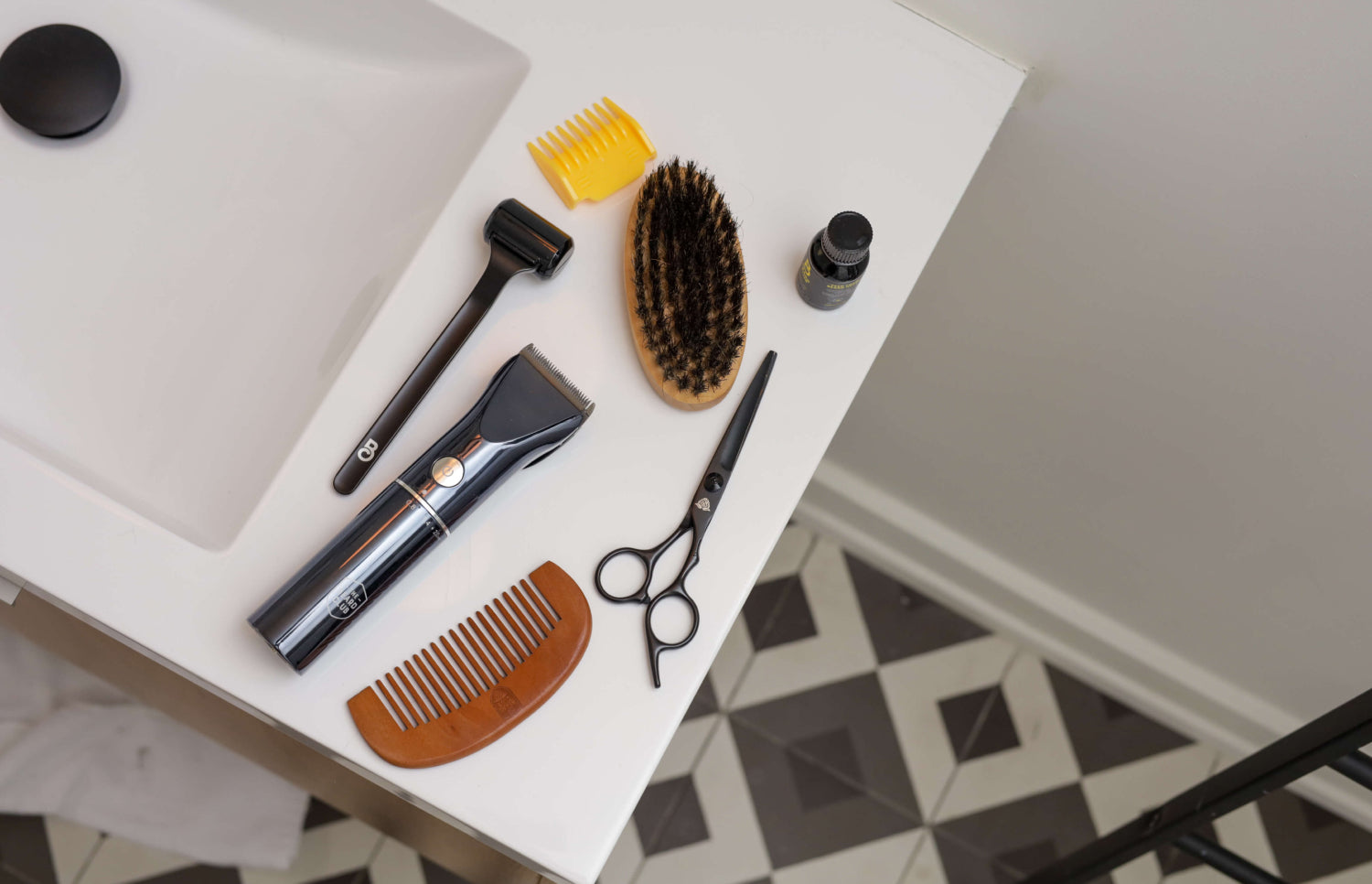 Image of beard grooming products sitting on bathroom sink