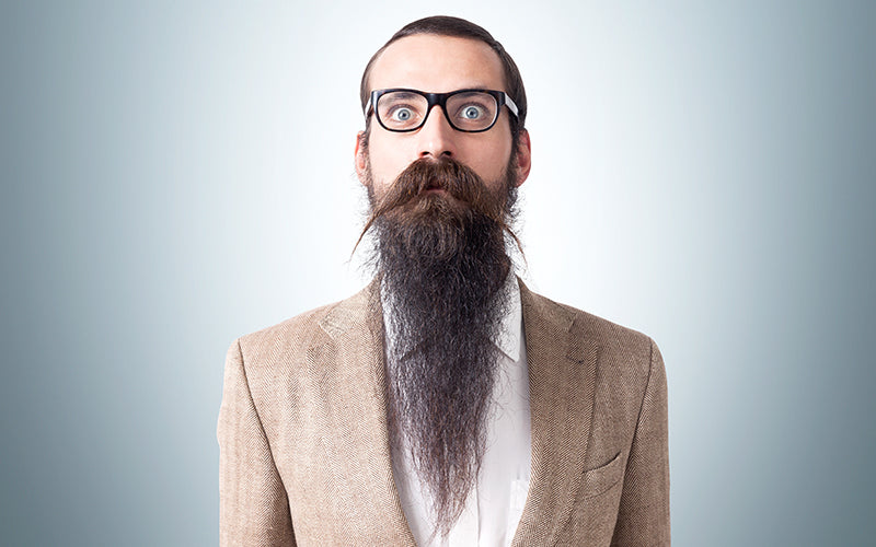 glaring man with long goatee
