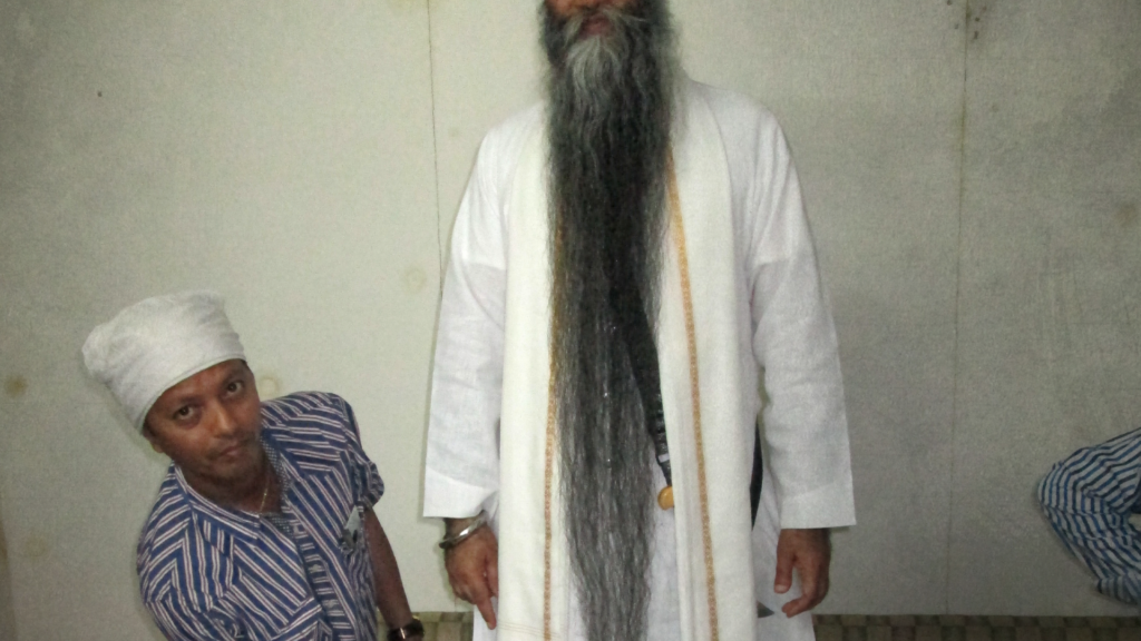 Man in robes with long goatee