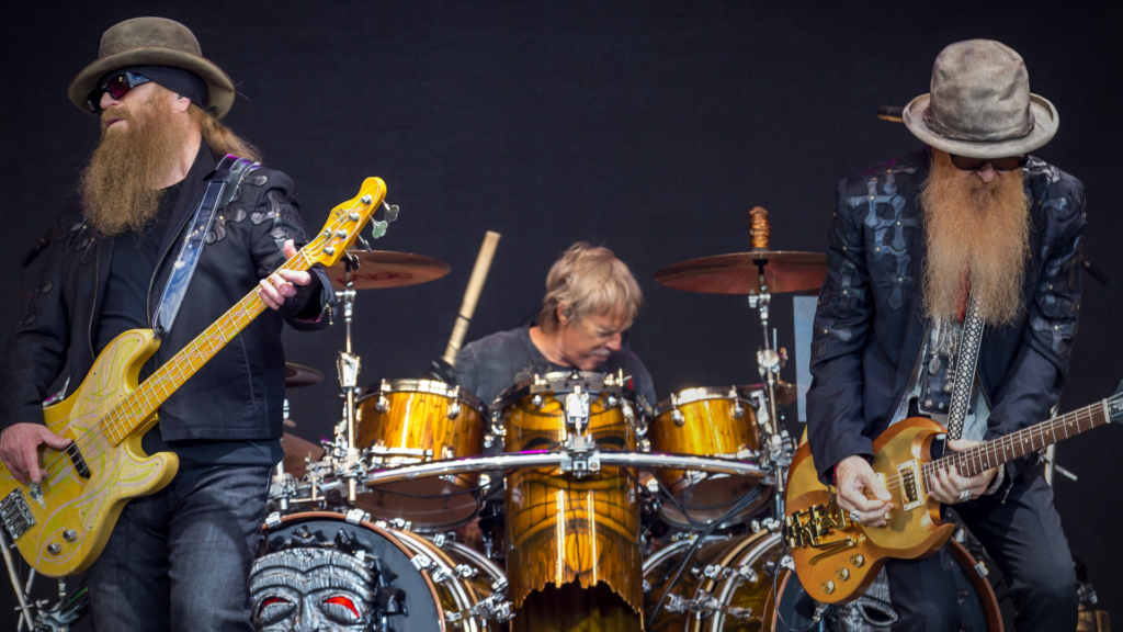 Bearded men playing guitars in a band